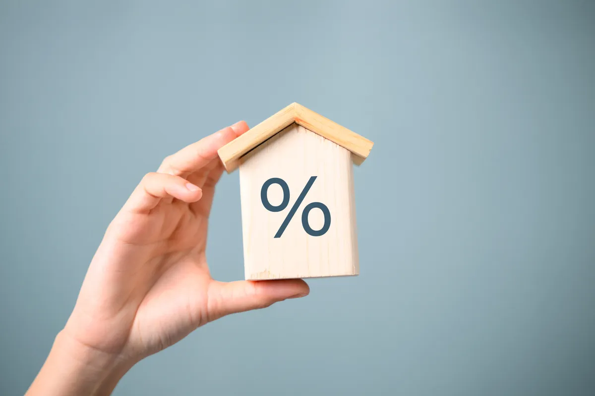 Investor comparing loan pricing scenarios