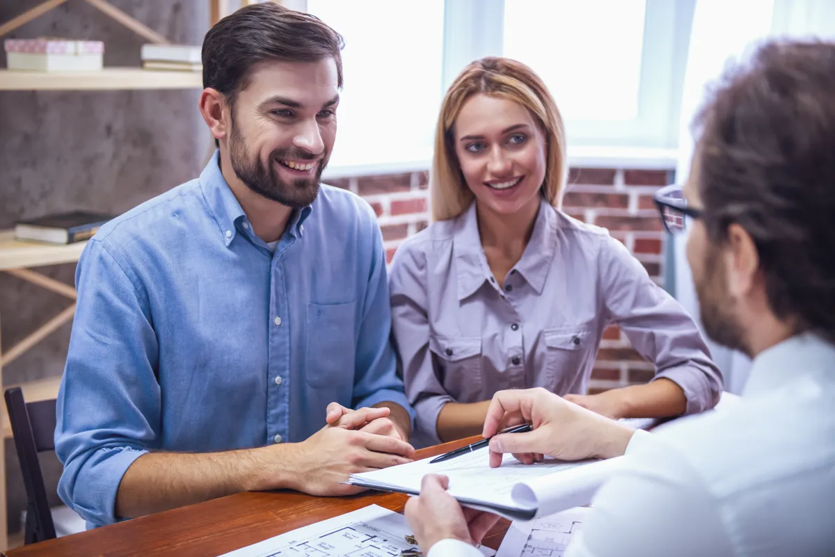 Loan officer comparing lender guidelines across screens